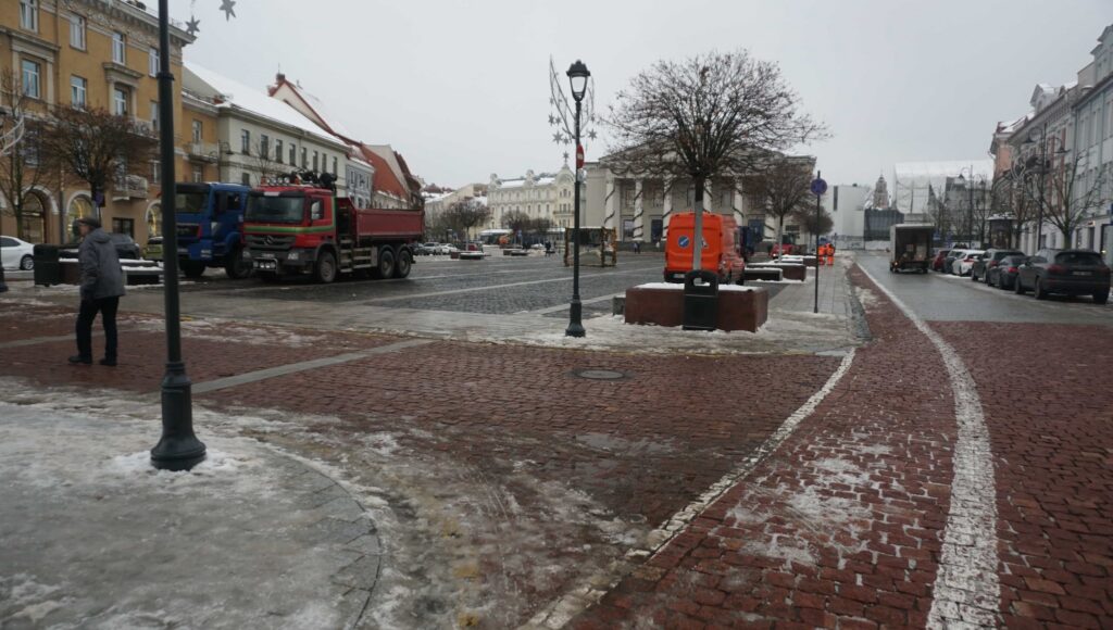 May be an image of 1 person, street and road