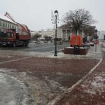 May be an image of 1 person, street and road